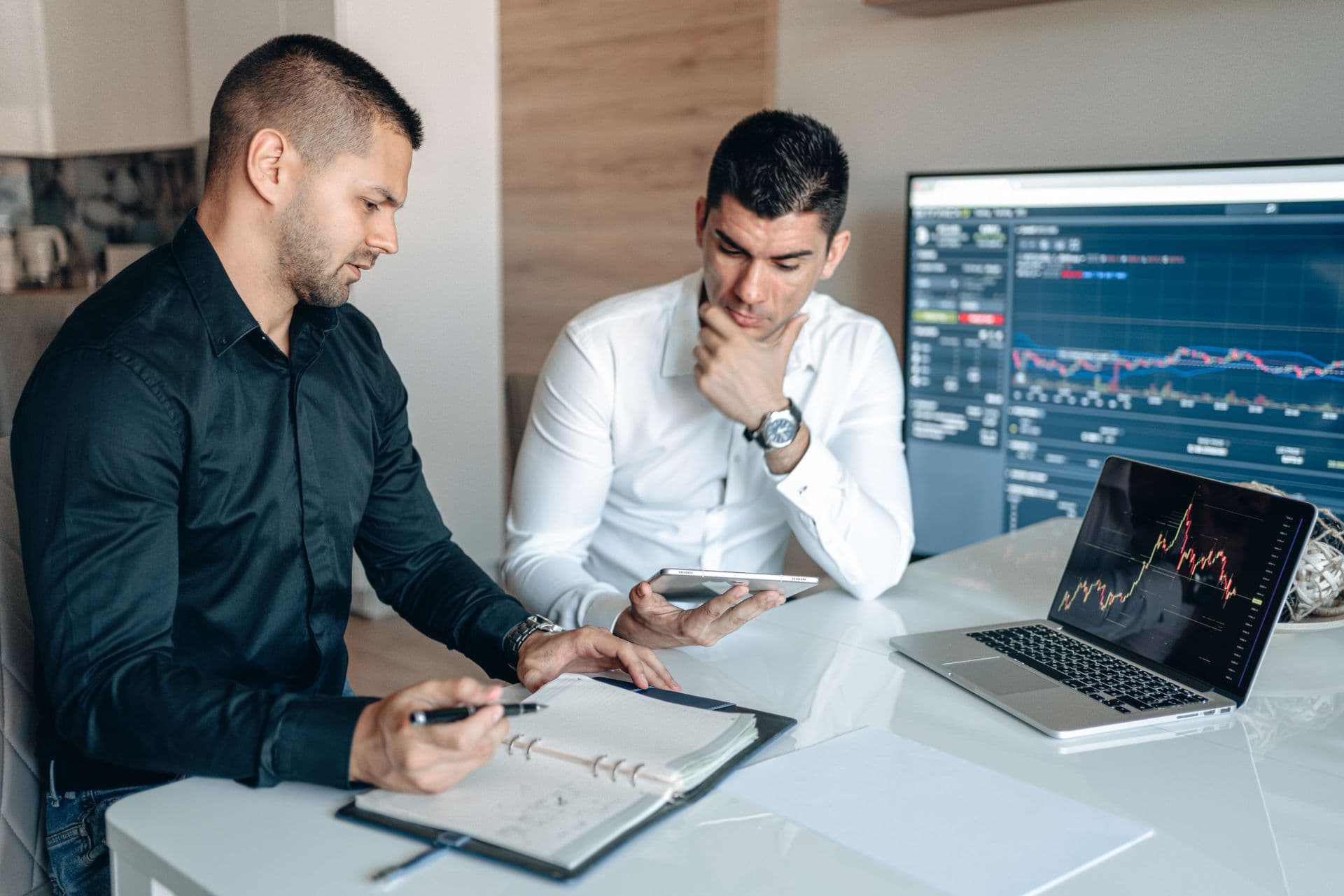 Trader working at a professional desk setup